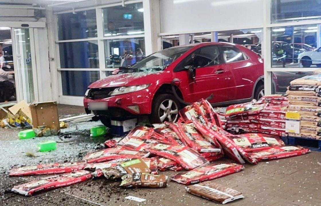 Man charged after car crashes through Tesco supermarket in Greenock | STV  News