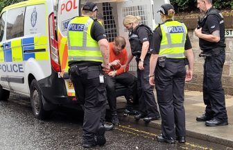 Criminal who ran from dock at Dundee court after hearing jail term found hiding under shipping container