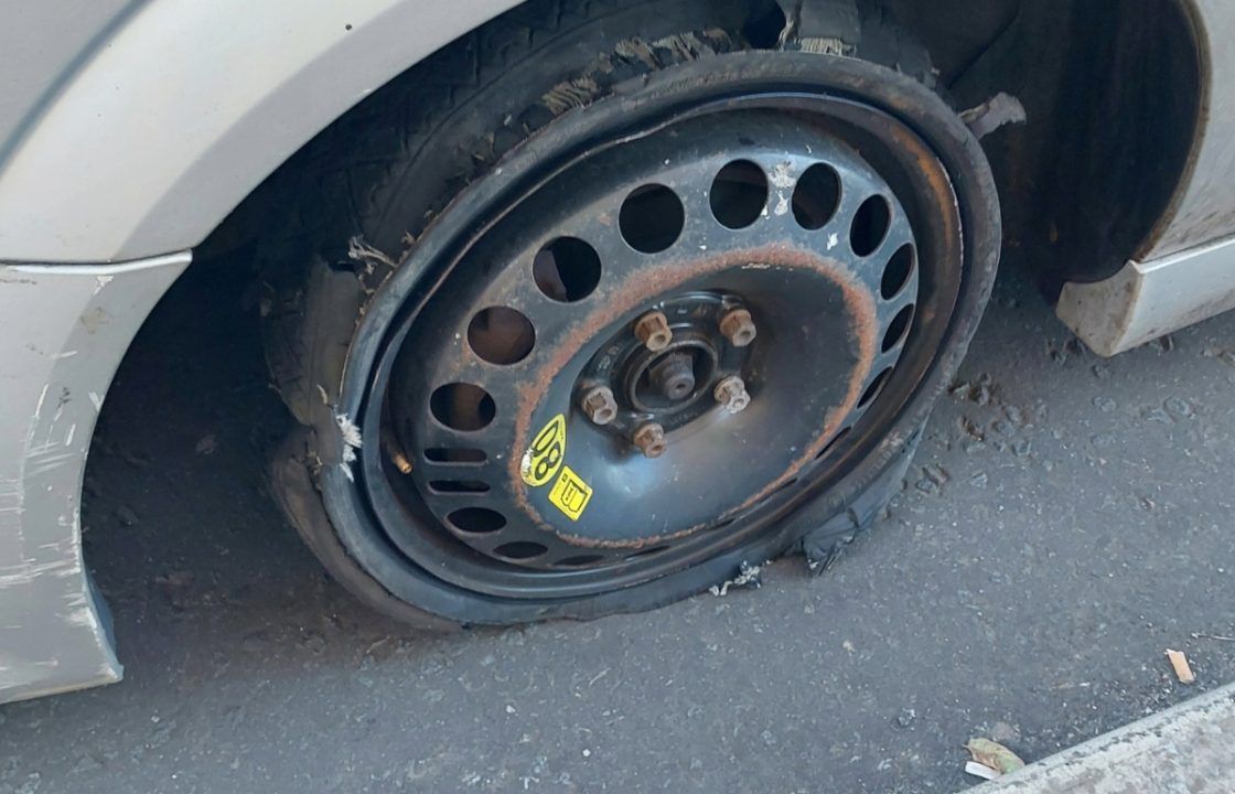 Car taken off road after driver stopped with ripped and deflated tyre in Edinburgh