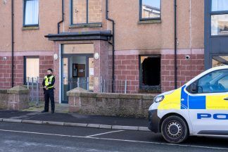 Firefighter taken to hospital after falling while attending ‘deliberate’ flat fire in Peterhead