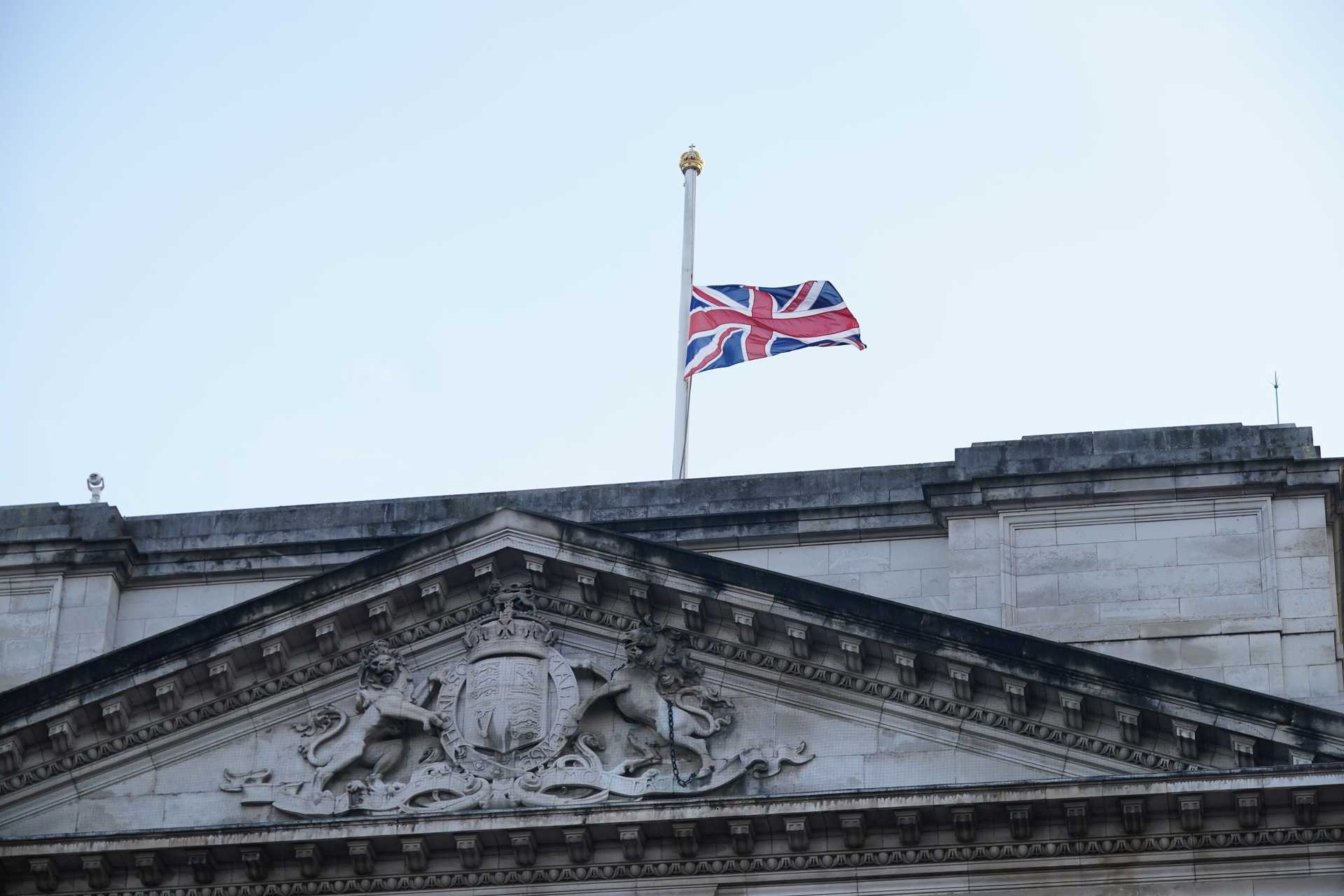 The Union Flag above Buckingham Palace is flown at half mast following the announcement of the death of Queen Elizabeth II (Yui Mok/PA) 