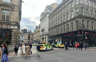 Police cordon off street near Glasgow Central Station as public urged to avoid the area