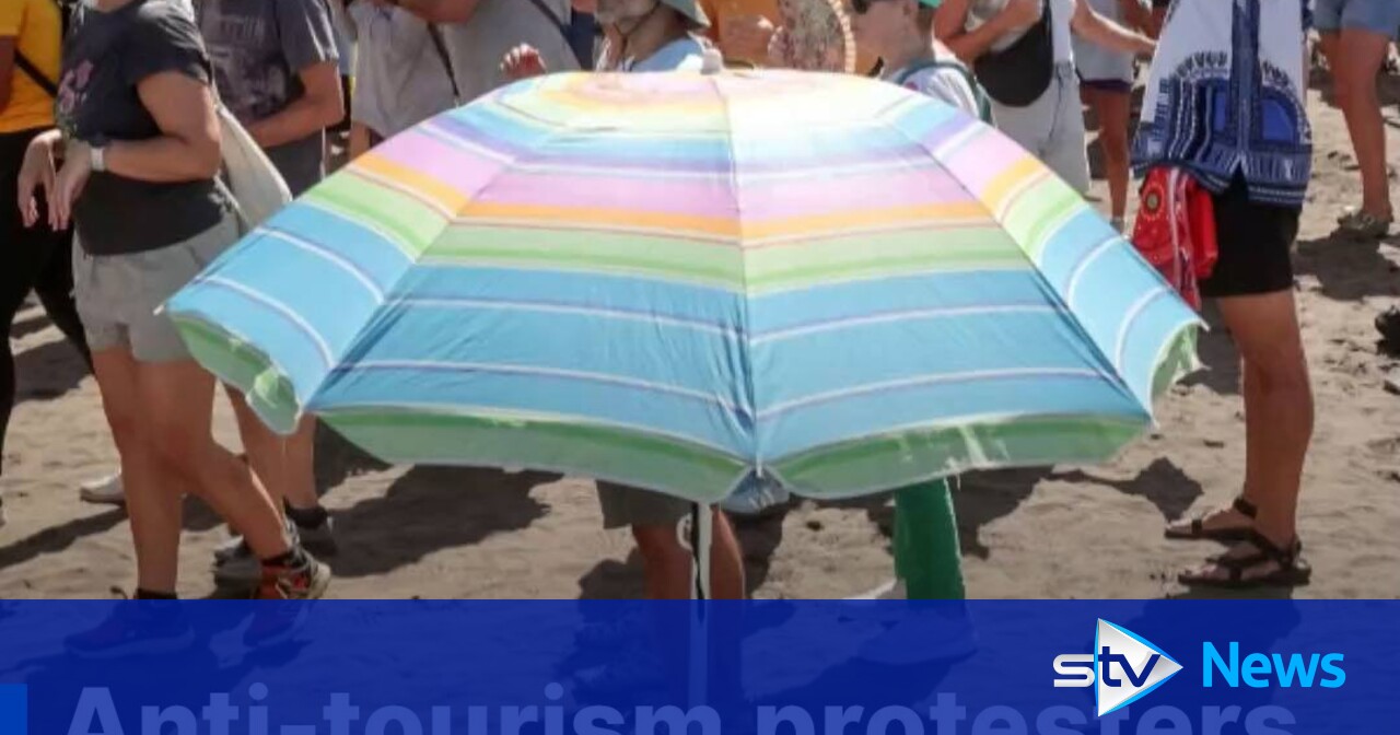 Antitourism protesters swarm Canary Islands holidaymakers STV News