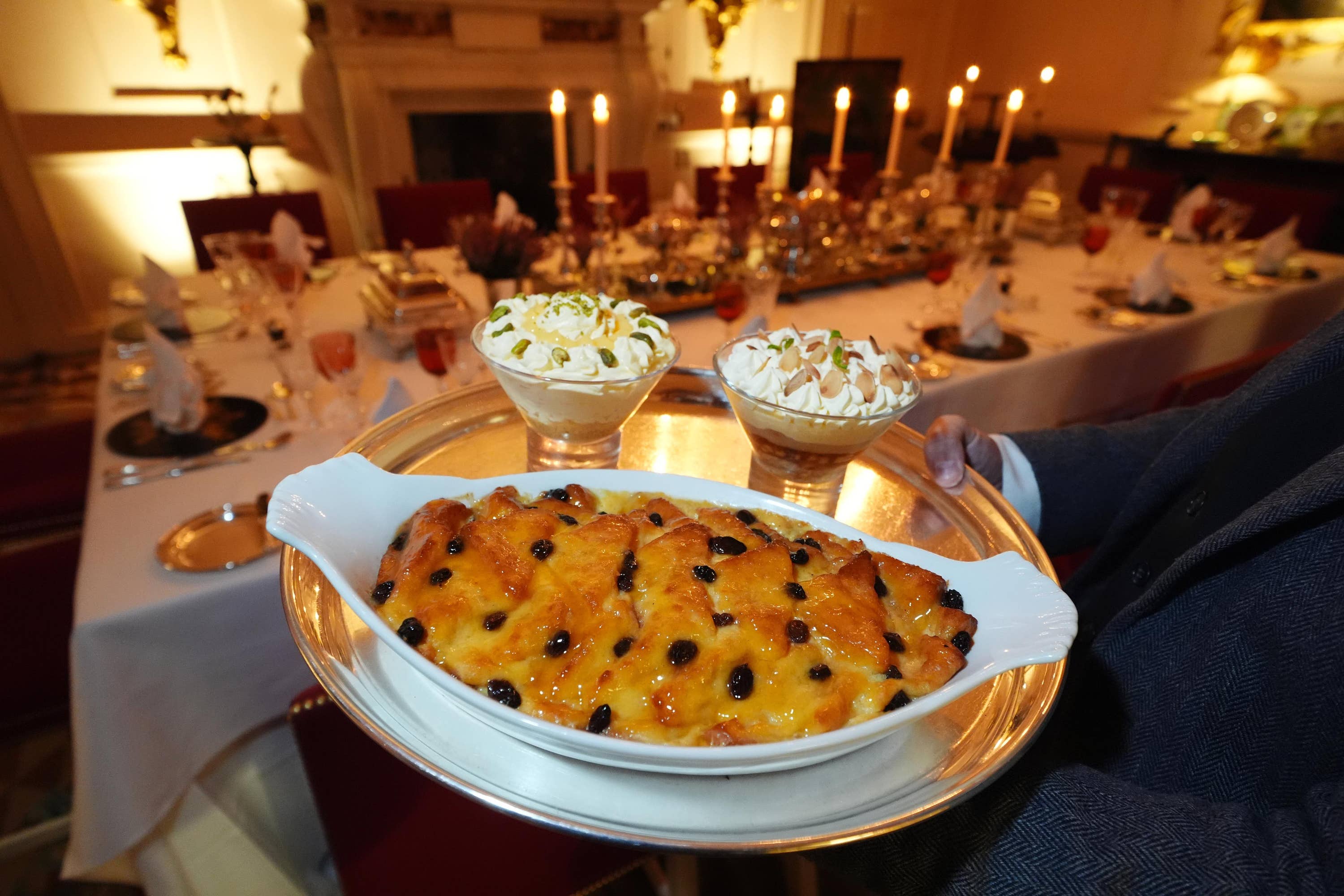 A lemon and pistachio syllabub, bread and butter pudding and an apple and almond trifle.