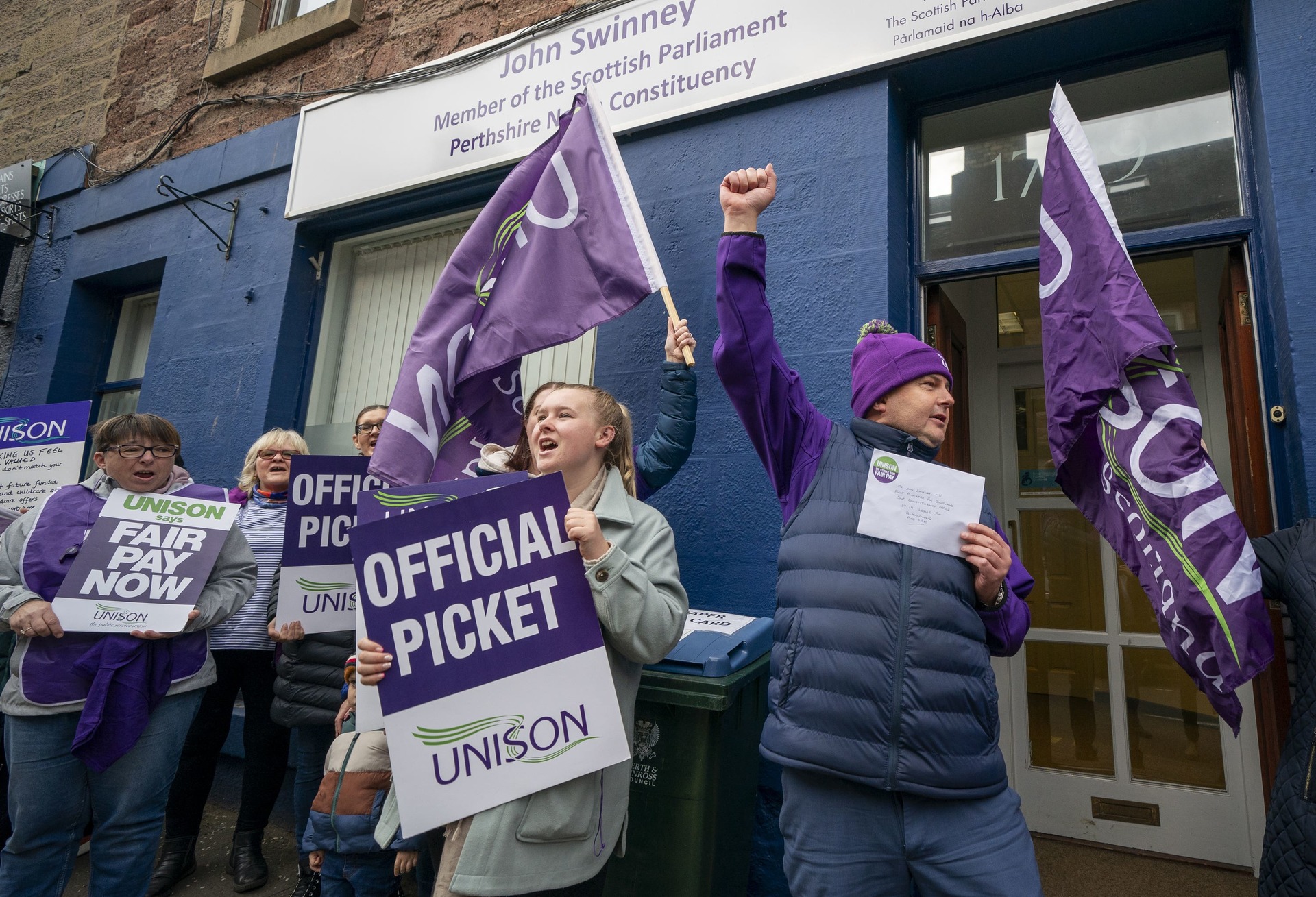 Unison members on strike staged a demo outside the First Minister’s office (Jane Barlow/PA). 