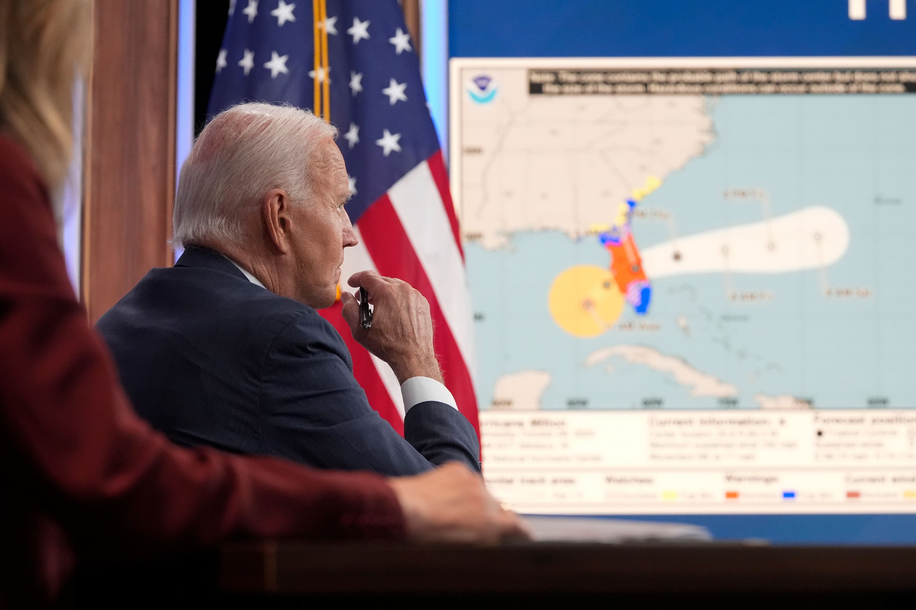 US President Joe Biden listens to a briefing about preparations for Hurricane Milton (Mark Schiefelbein/AP). 