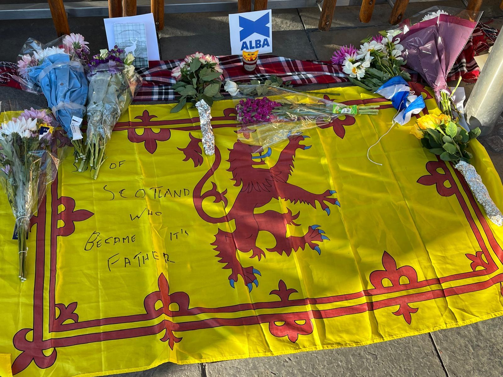 Floral tributes left outside Scottish Parliament