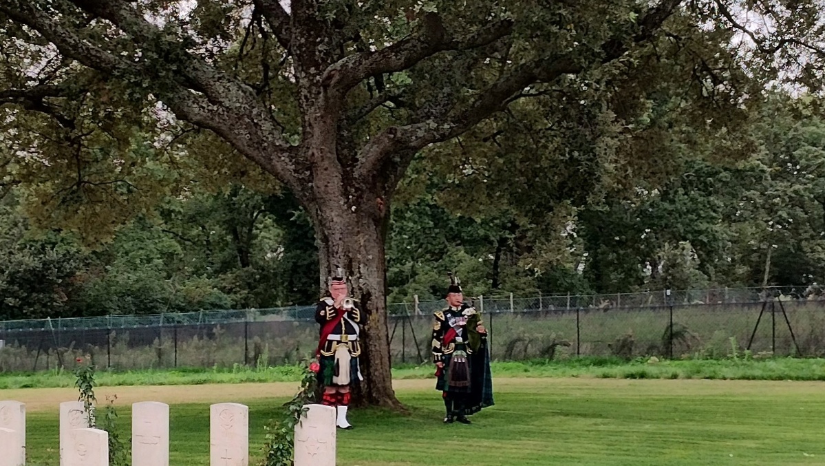 A bugler and piper were present at the rededication service (Crown Copyright/PA) 