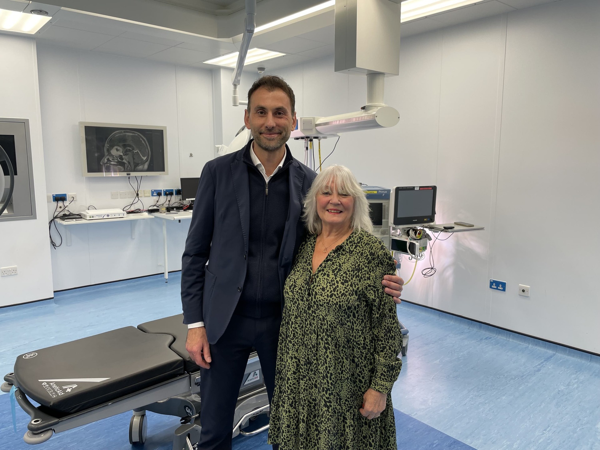 Surgeon Anastasios Giamouriadis with patient Doreen Adams (PA). 