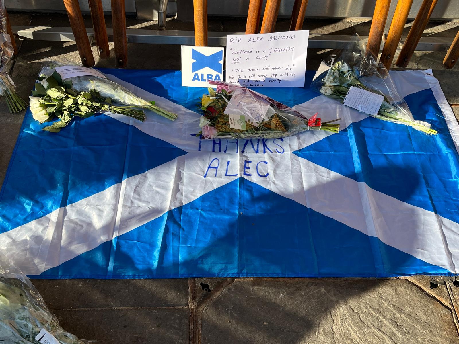 Floral tributes left outside Scottish Parliament