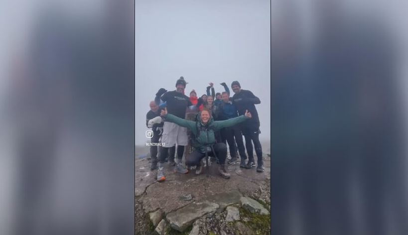 Summiting Ben Nevis, the UK's highest peak at 4,412ft.