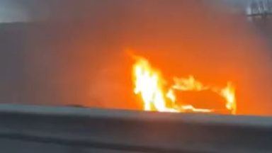 Emergency services called to car engulfed in flames on M90