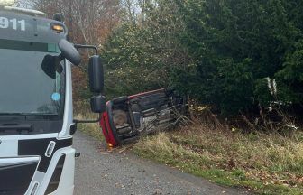 Driver allegedly under influence of alcohol arrested after car flips off road in South Queensferry