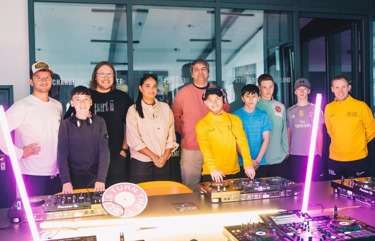  Hannah Laing and Street Soccer Scotland members at doof Studios.