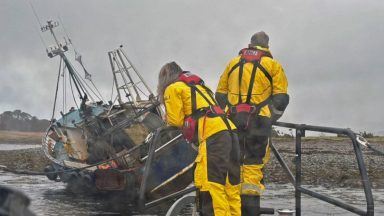 Fishermen rescued after boat runs aground on banks of Loch Linnhe