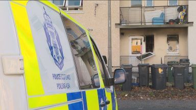 Ten taken to hospital after fire in block of flats