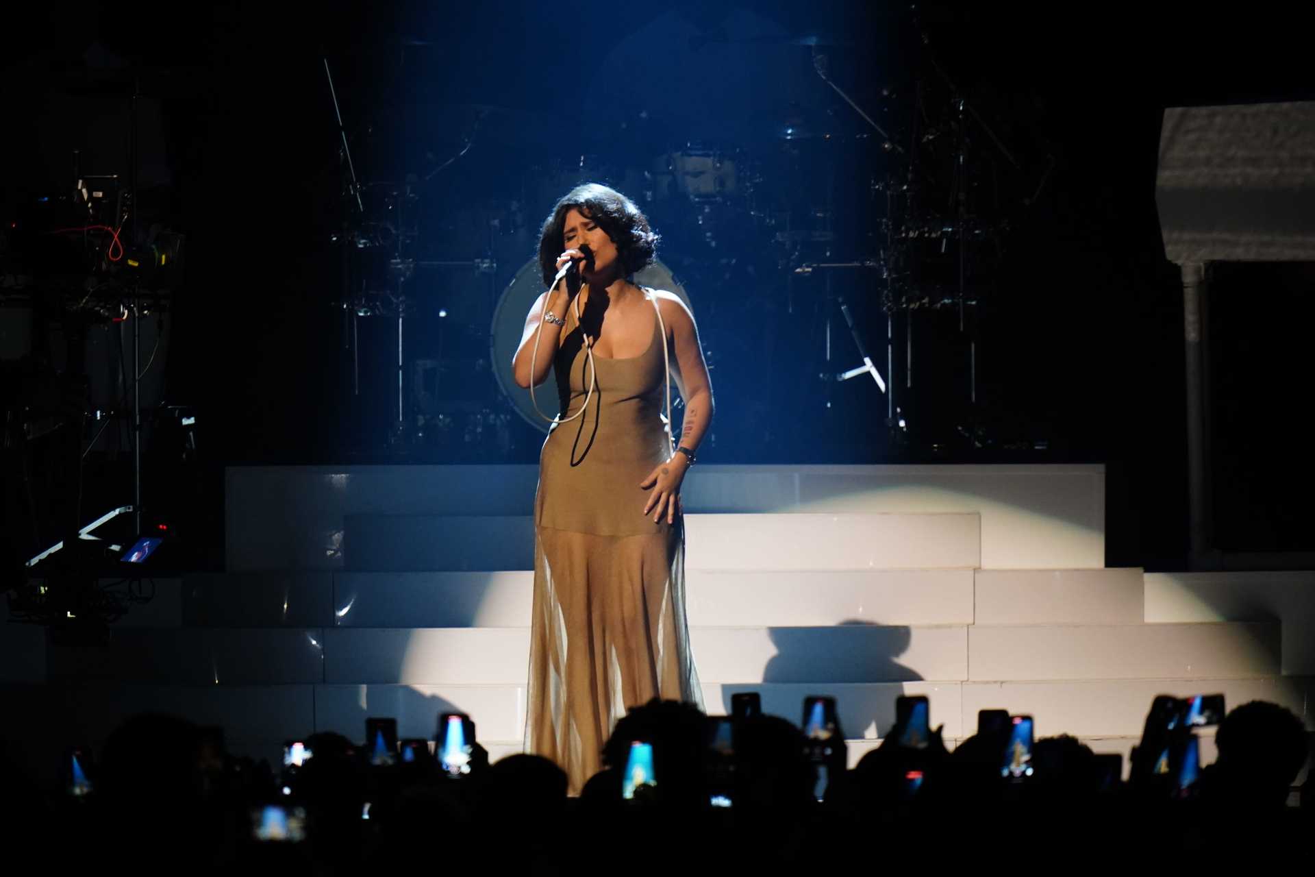 Raye performs on stage at the awards (Ian West/PA). 