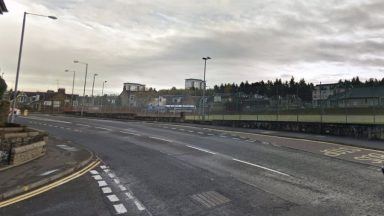 Man, 76, dead following collision between BMW car and taxi on Falkirk street