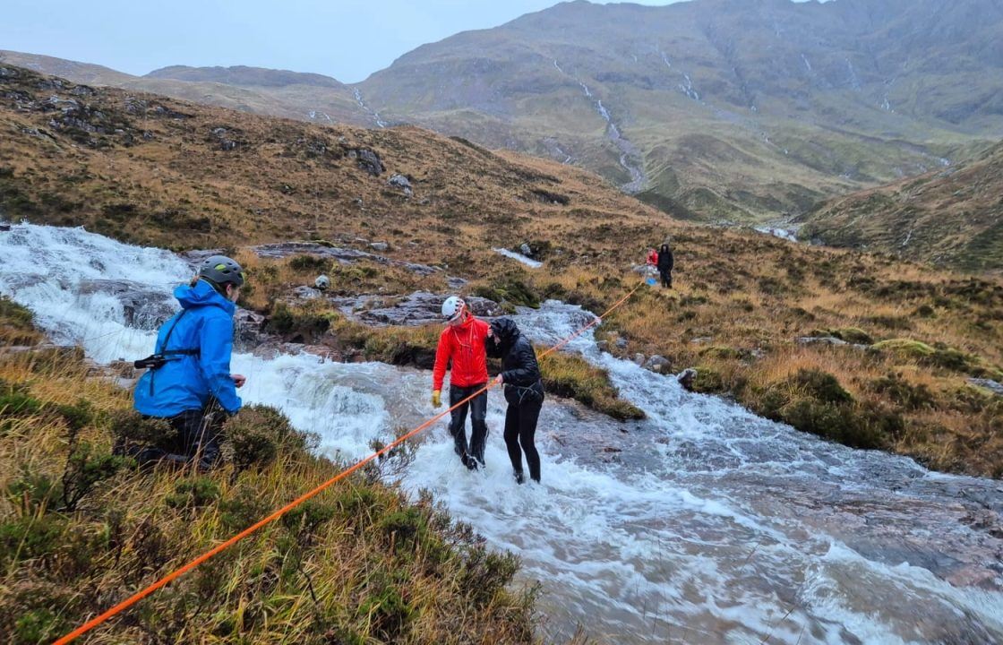 Two walkers rescued after becoming trapped by rising burns in the Highlands