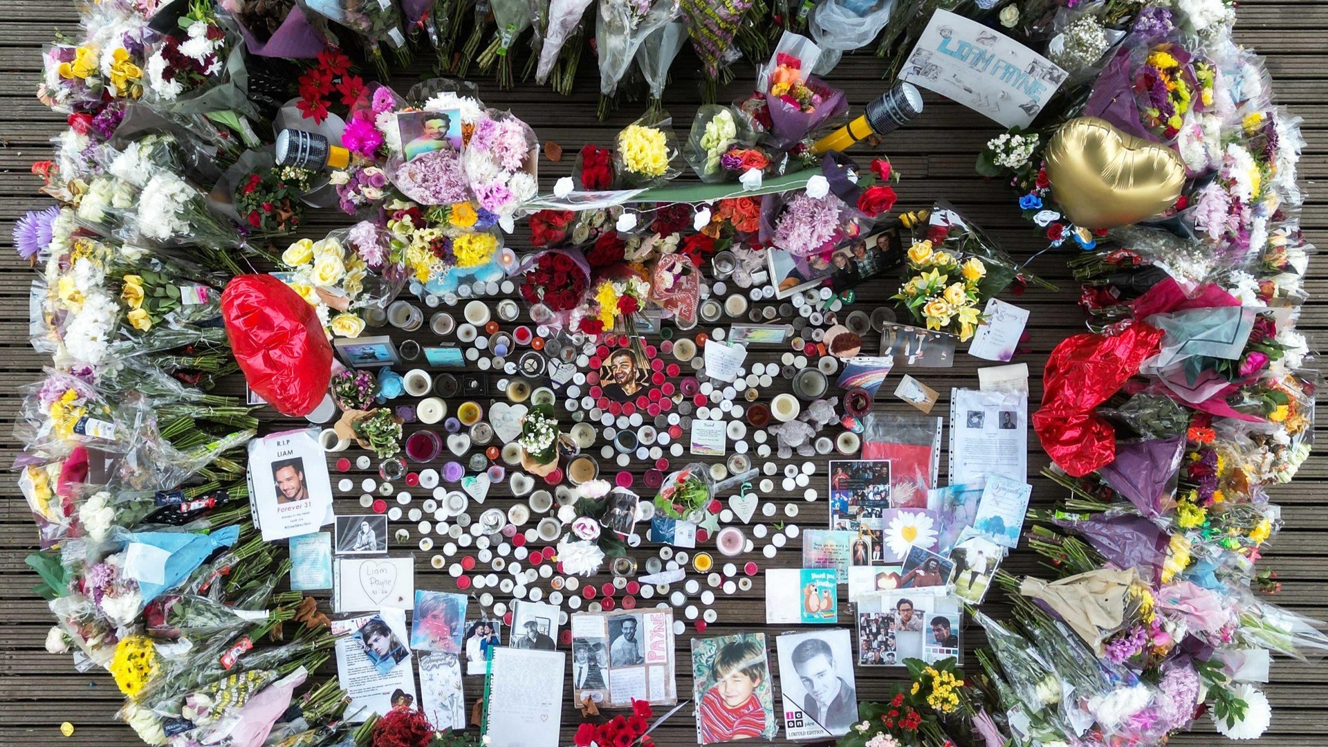 Floral tributes to singer Liam Payne which have been moved by authorities to West Park in his hometown of Wolverhampton