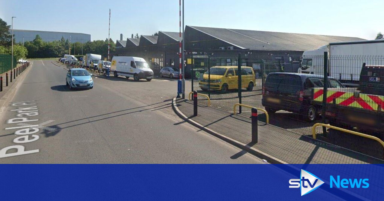 Man taken to hospital after car crashes into building in East Kilbride ...