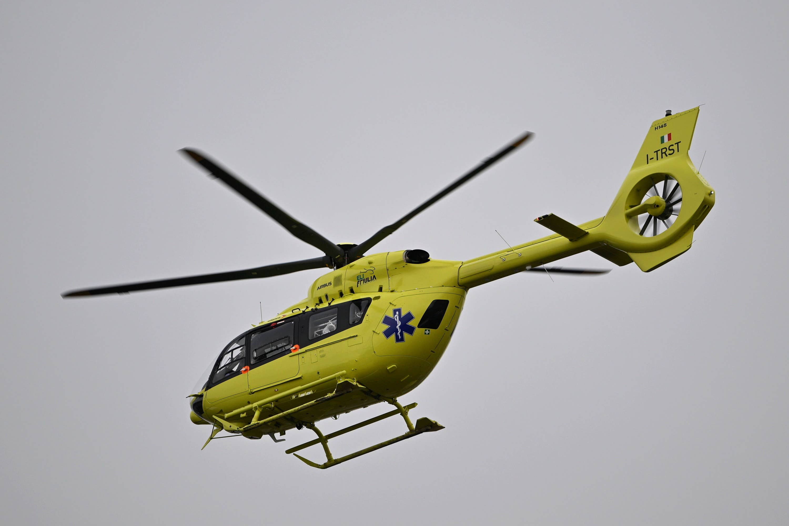 An ambulance helicopter takes off from the elementary school following the knife attack (Damir Krajac/AP) 