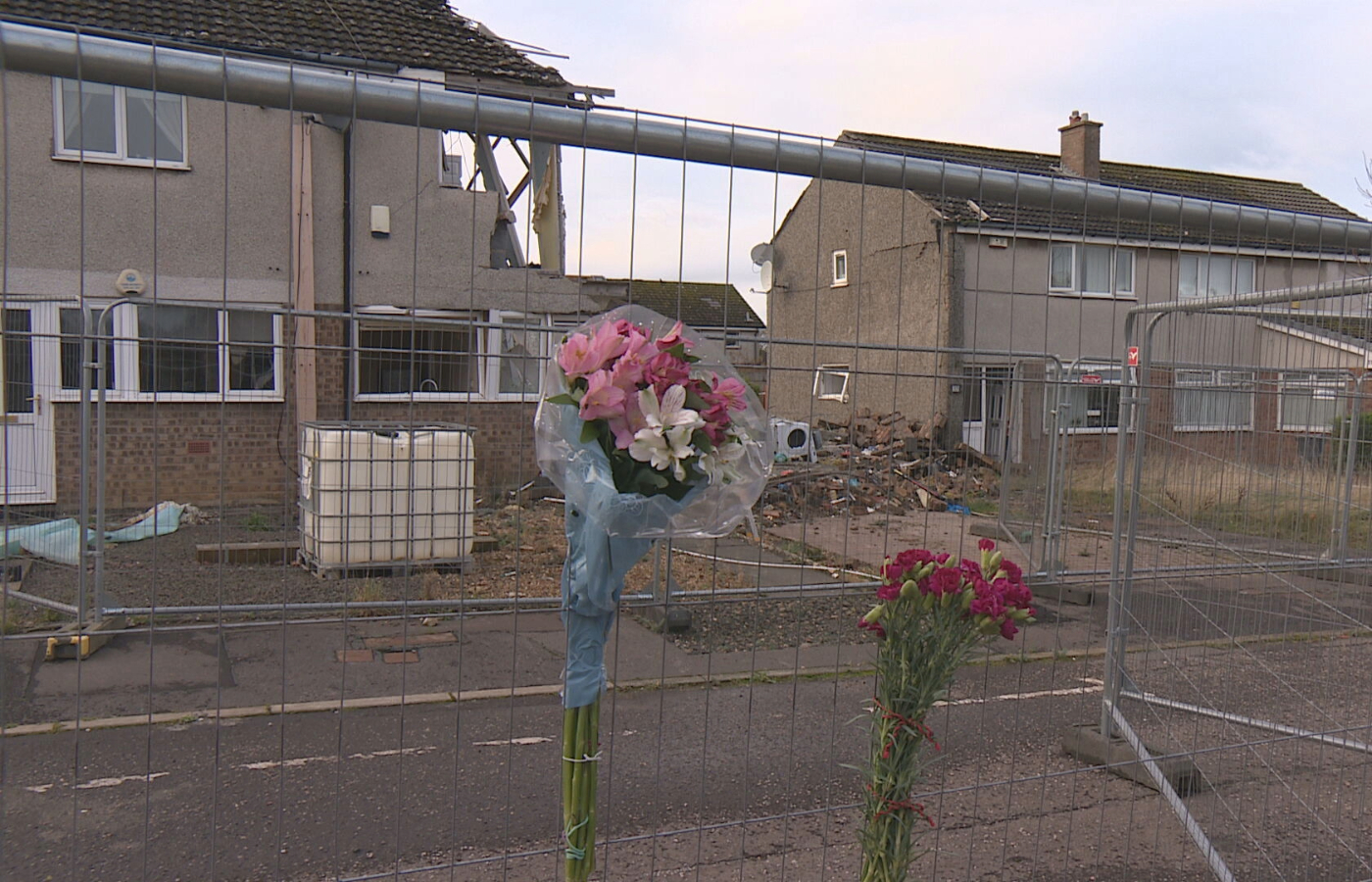 Flowers paying tribute to James Smith, the 84-year-old man who died in the explosion.