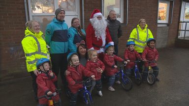 Santa Claus surprises nursery children in Glasgow with new bikes thanks to cycling charity