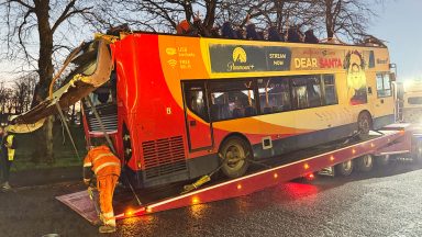 Four in hospital after roof of double-decker bus torn off in crash with bridge