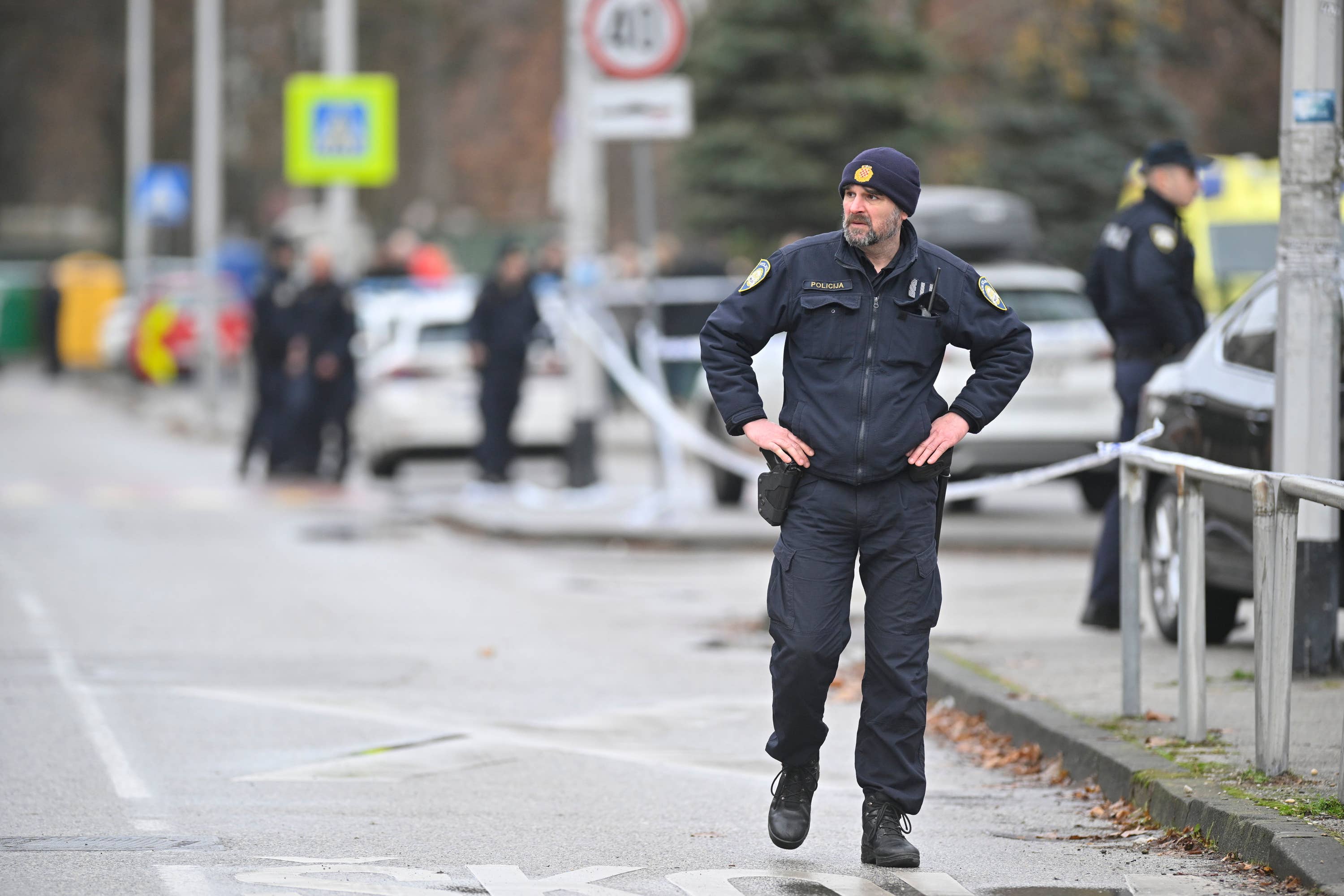 Police secure access to the school where a seven-year-old girl died and a teacher and five other students were wounded in a knife attack in Zagreb (Damir Krajac/AP) 