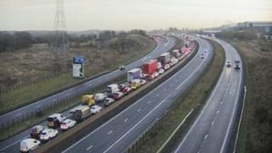 M8 closed at rush hour after vehicle catches fire near Newhouse