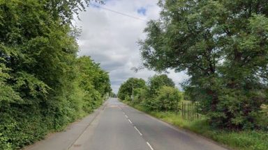 Johnstone road closed after man knocked down by vehicle