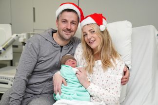 Christmas baby comes early and interrupts parents’ movie night