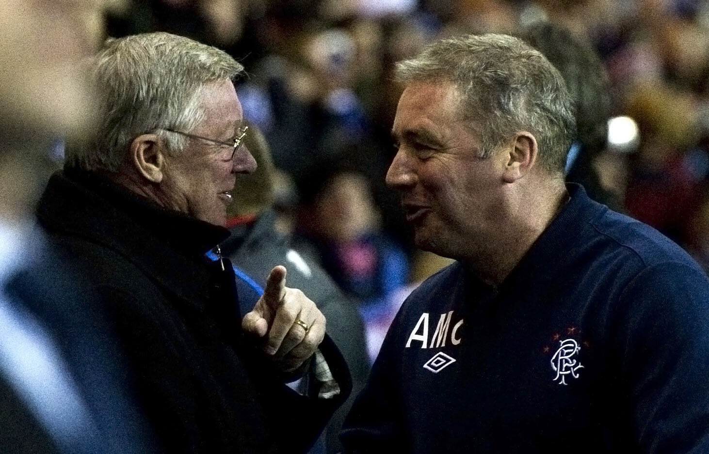 Rangers assistant manager Ally McCoist chats with Manchester Utd boss Sir Alex Ferguson ahead of 2010 clash. 