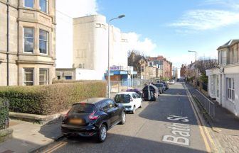 Hunt for three men wearing balaclavas as teenager found seriously injured on Bath Street in Portobello