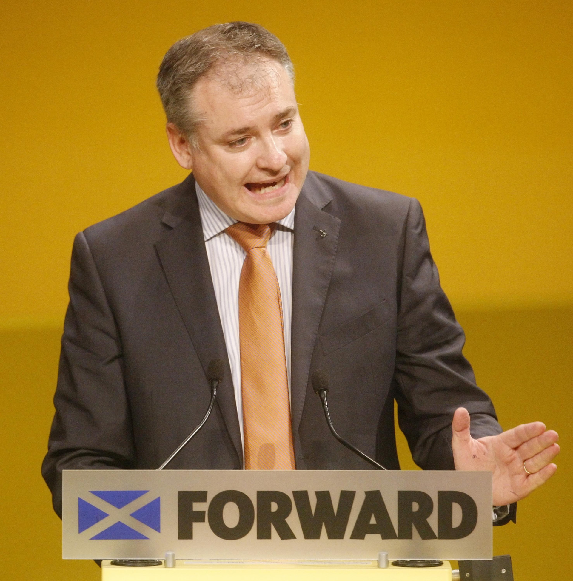 Richard Lochhead addresses the 77th Scottish National Party annual conference at the Eden Court Theatre in Inverness (Danny Lawson/PA). 