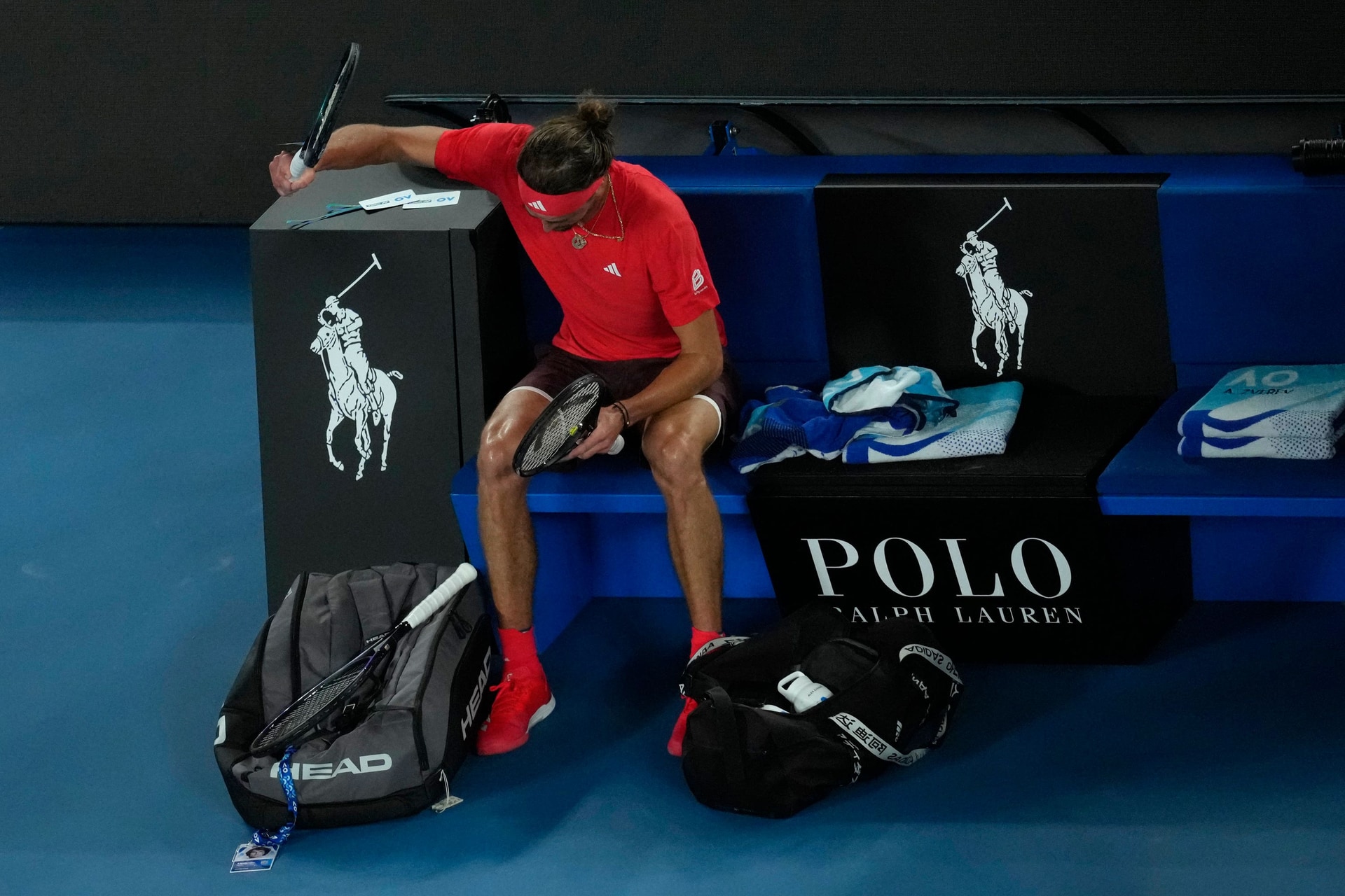 <em>Alexander Zverev slammed his racket into his bag after losing the second set (Manish Swarup/AP)</em>”/><cite class=cite>PA Media</cite></div><figcaption aria-hidden=true><em>Alexander Zverev slammed his racket into his bag after losing the second set (Manish Swarup/AP)</em> <cite class=hidden>PA Media</cite></figcaption></figure><p>Zverev landed 81 per cent of his first serves in the opening set but still faced six break points and, on the last of them in the eighth game, an ill-advised foray to the net proved his undoing.</p><p>Sinner’s ability to not just retrieve balls but fire winners while on the stretch is extraordinary and he soon had Zverev under pressure in the second set as well.</p><p>But this time the second seed, who had benefited from Novak Djokovic’s retirement after one set of their semi-final, repelled the threat and began to find some success on the front foot.</p><p>Sinner dug himself out of a hole at 0-30 in the 10th game and then had the crowd on their feet by winning an amazing back-and-forth rally at 30-30 in his next service game, finally sending a winner past Zverev and standing with fist clenched in quiet celebration.</p><p>Neither man shows much emotion on court and this baseline slugging match was largely a difficult one for the crowd to get into.</p><figure class=