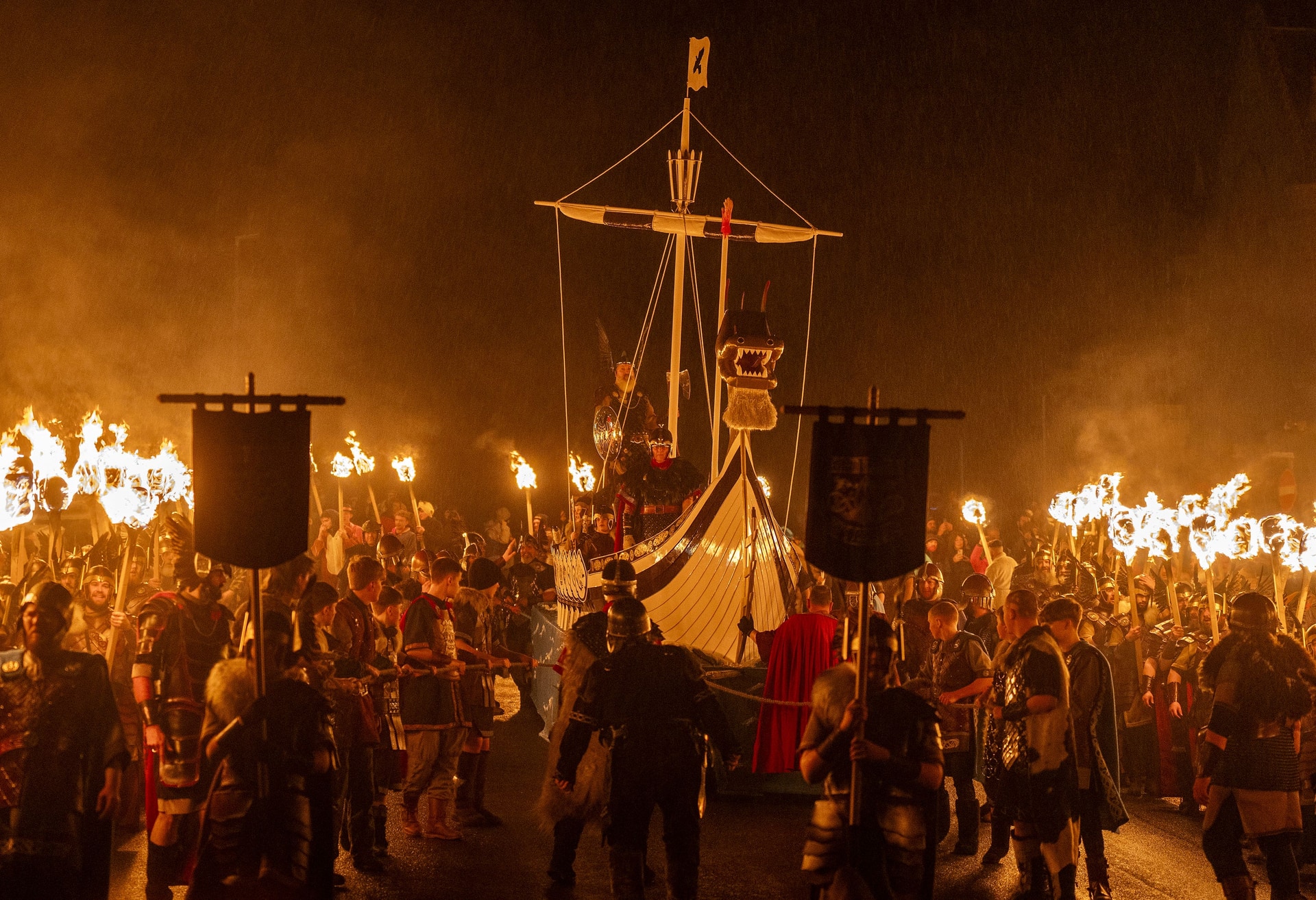 The Jarl Squad set light to the galley in Lerwick (Jane Barlow/PA)