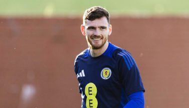 Scotland captain Andy Robertson signs for Spurs