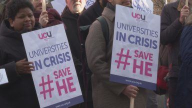 Lectures hold demonstration outside parliament amid university budget crisis