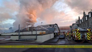 Huge fire erupts in garage near Aberdeen’s Pittodrie football stadium 