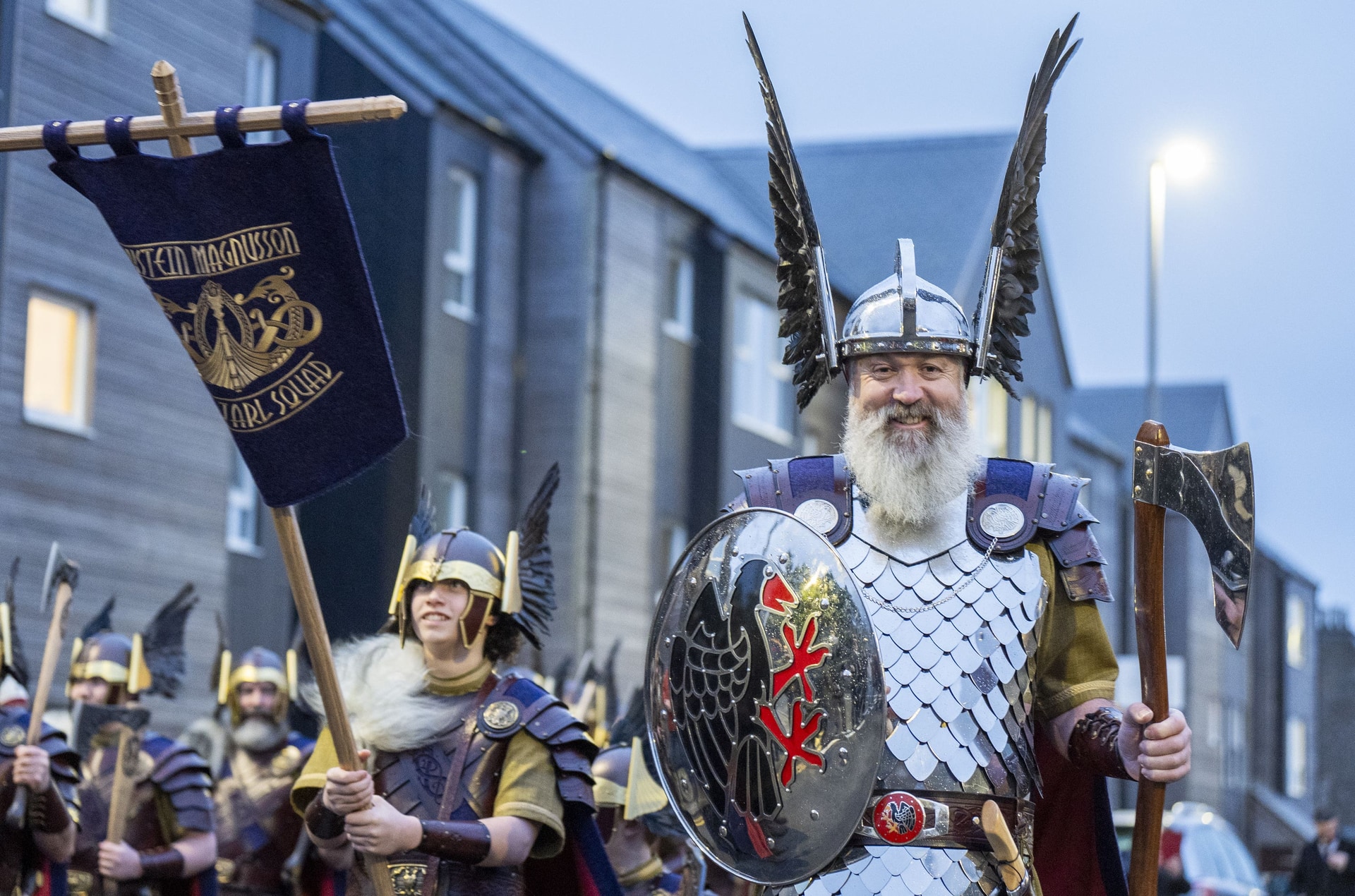 The event ends in a spectacular procession in Lerwick harbour (Jane Barlow/PA) 