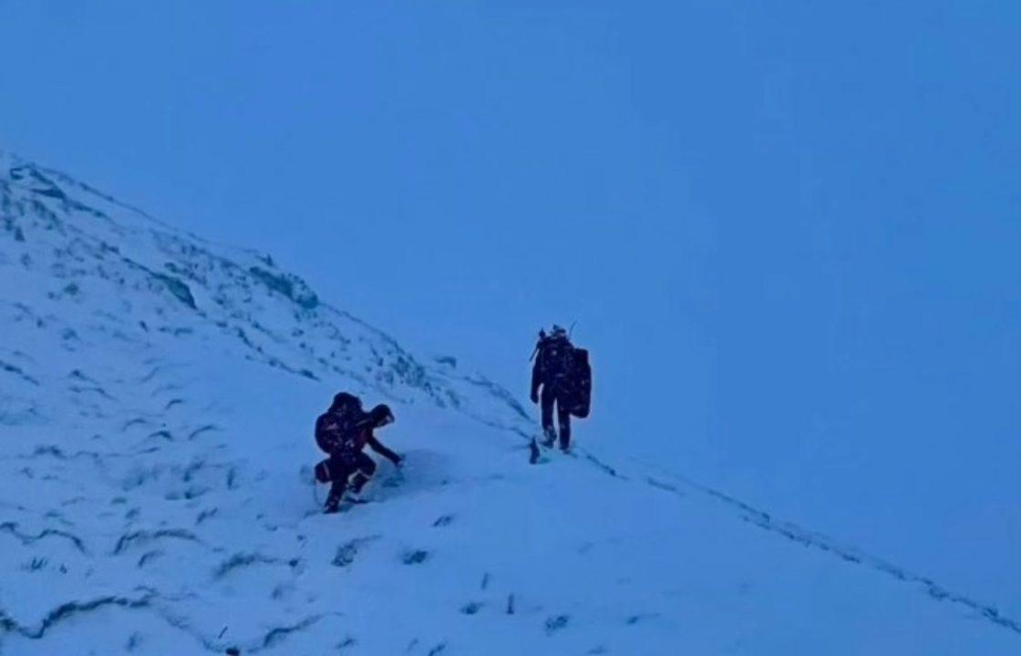 Walker suffers upper body injuries but survives after falling 200m on mountain