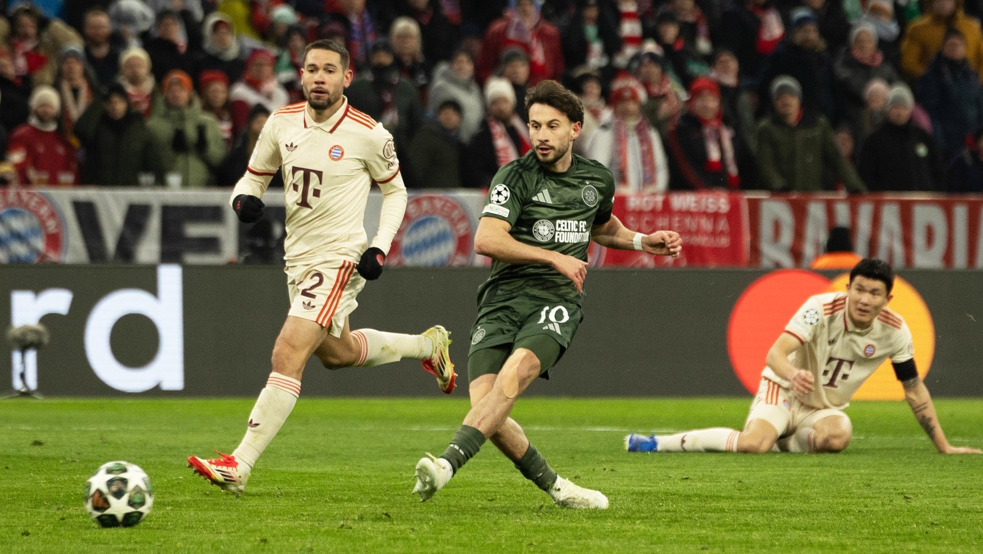 Celtic’s Nicolas Kuhn scores to make it 1-0 during the UEFA Champions League 2024/25 League Knockout Play-off second leg match between FC Bayern Munich and Celtic at the Allianz Arena, on February 18, 2025, in Munich, Germany. (Photo by Craig Foy / SNS Group)