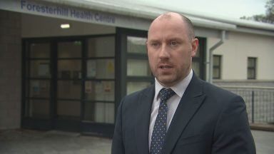 Health secretary apologises to patients as NHS board struggles with demand