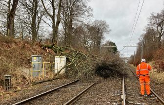 Scotland battered by strong winds and heavy rain as roads flooded amid yellow warning