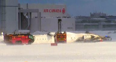 Eight hurt as Delta Airlines plane overturns on landing at Toronto airport