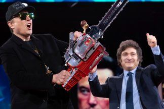 Musk wields chainsaw on stage at conservative conference