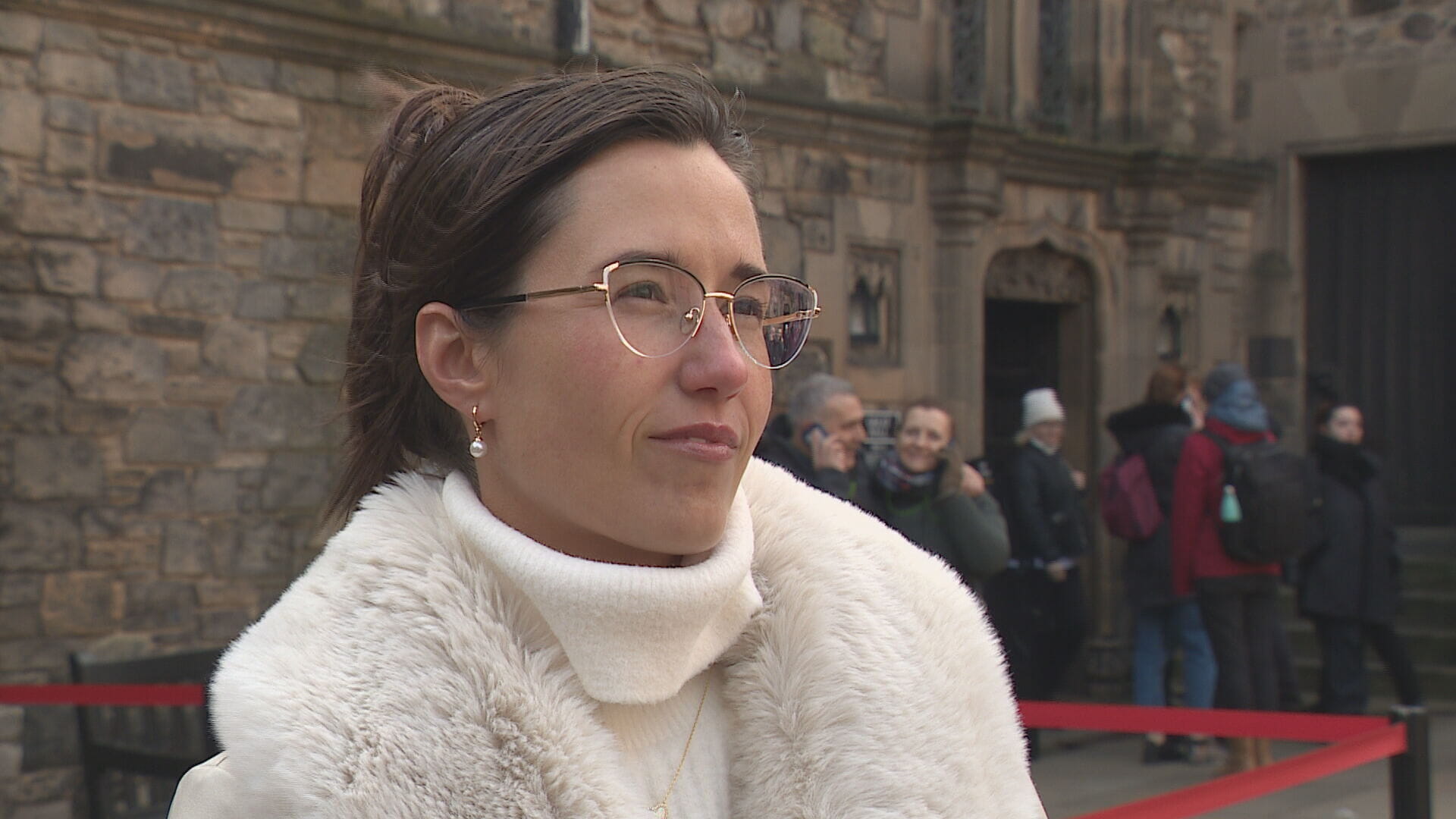 Julia Btushkina speaking at the service marking the third anniversary of the Russian invasion of Ukraine 