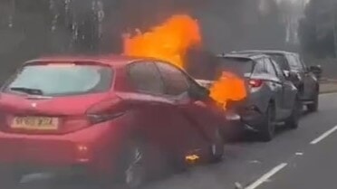 Man taken to hospital after car bursts into flames following three-vehicle crash